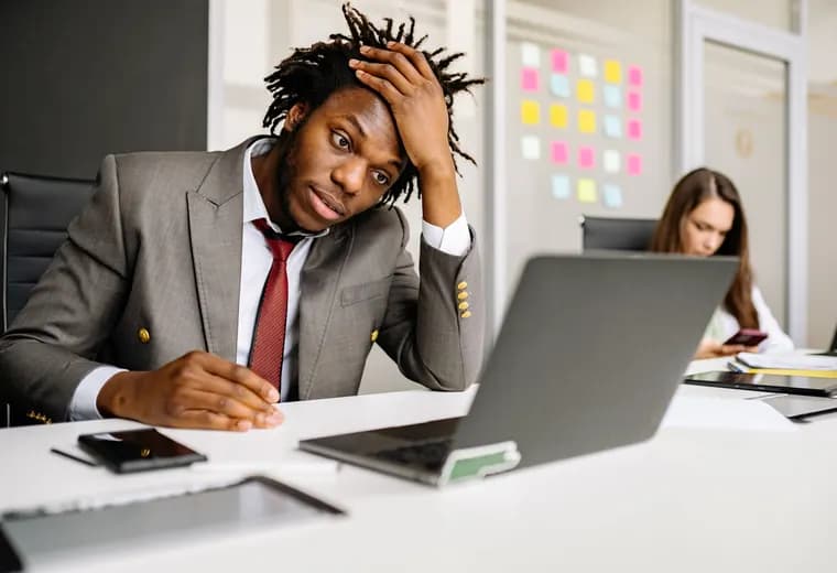 A frustrated user struggling with a confusing, poorly designed interface